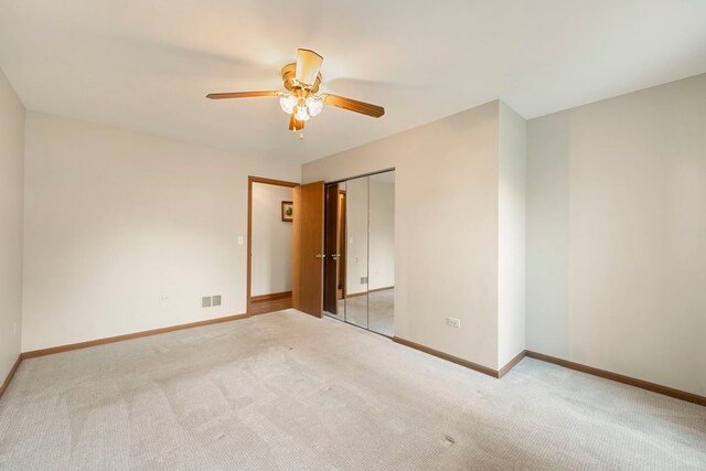 3072 Carlton Ct, Westchester, IL 60154 - unfurnished bedroom featuring carpet flooring, a ceiling fan, and a closet
