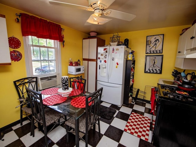 1742 N 34th Ave, Stone Park, IL 60165 - kitchen featuring white appliances, tile patterned floors, cooling unit, and a ceiling fan