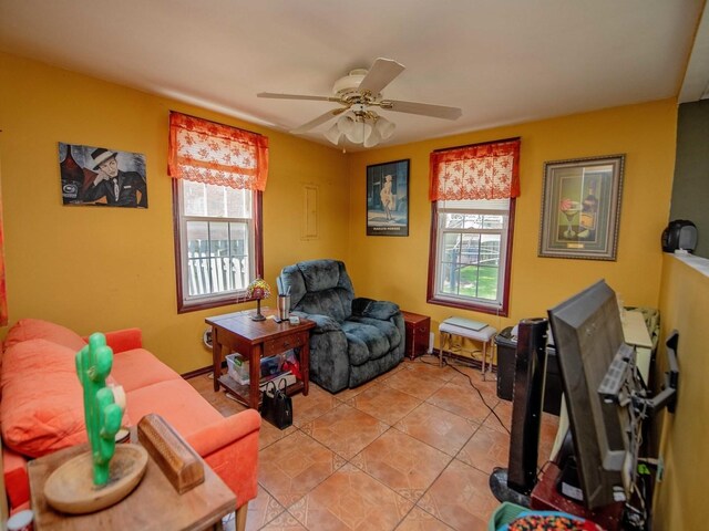 1742 N 34th Ave, Stone Park, IL 60165 - living area featuring ceiling fan and light tile patterned floors