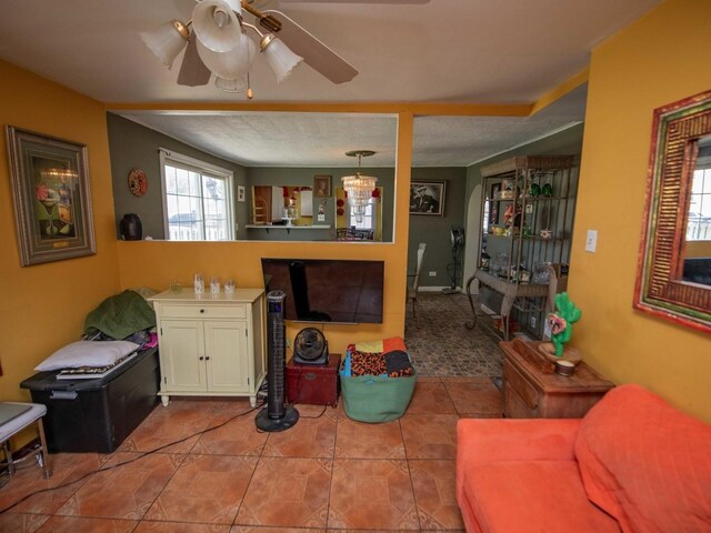 1742 N 34th Ave, Stone Park, IL 60165 - living area featuring a ceiling fan and tile patterned flooring