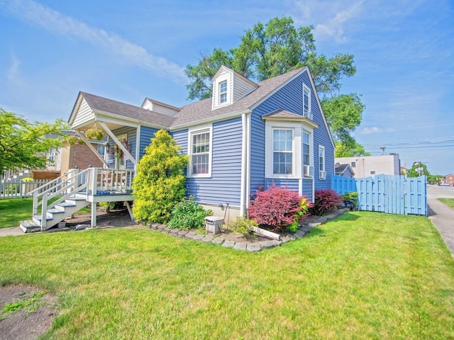 1742 N 34th Ave, Stone Park, IL 60165 - view of front of property with a deck and a shingled roof