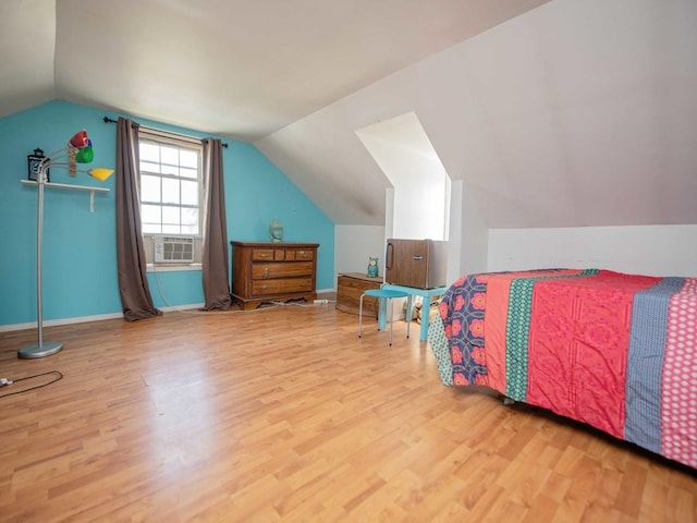 1742 N 34th Ave, Stone Park, IL 60165 - bedroom featuring wood finished floors, cooling unit, and vaulted ceiling