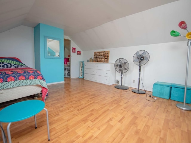 1742 N 34th Ave, Stone Park, IL 60165 - bedroom featuring wood finished floors and vaulted ceiling