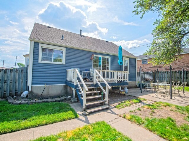 1742 N 34th Ave, Stone Park, IL 60165 - back of house featuring a patio, a deck, and a shingled roof