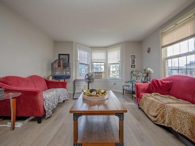 1742 N 34th Ave, Stone Park, IL 60165 - living room featuring healthy amount of natural light, wood finished floors, and cooling unit