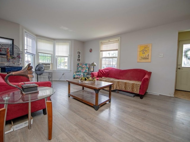 1742 N 34th Ave, Stone Park, IL 60165 - living room with light wood-type flooring and cooling unit