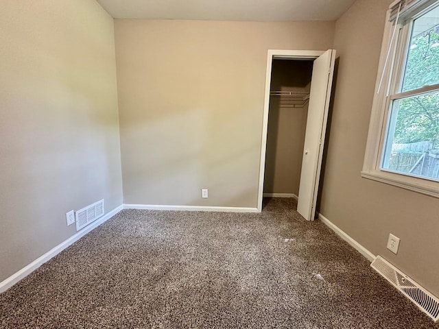 303 Ann St, South Elgin, IL 60177 - unfurnished bedroom with carpet floors and a closet