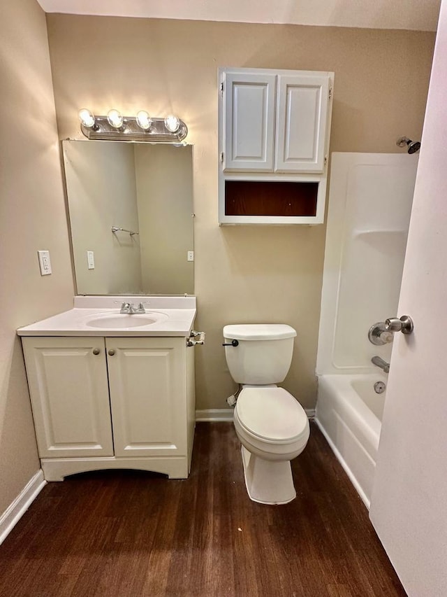 303 Ann St, South Elgin, IL 60177 - bathroom featuring wood finished floors, vanity, and bathing tub / shower combination