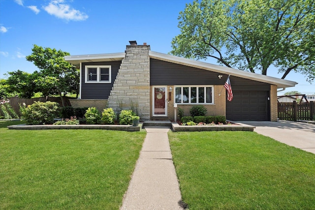 9912 S Kolmar Ave, Oak Lawn, IL 60453 - view of front of home featuring brick siding, driveway, an attached garage, and a chimney