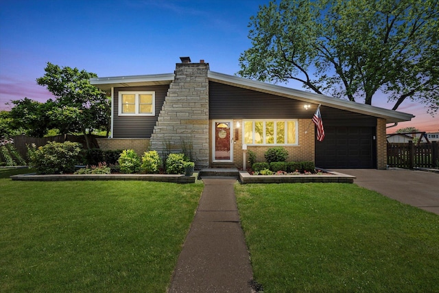 9912 S Kolmar Ave, Oak Lawn, IL 60453 - view of front of property with brick siding, a chimney, an attached garage, and concrete driveway