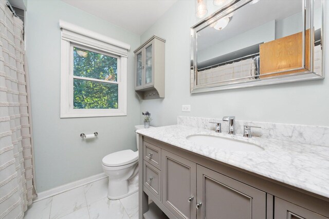 9912 S Kolmar Ave, Oak Lawn, IL 60453 - bathroom featuring vanity and marble look tiles