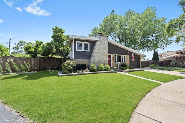 9912 S Kolmar Ave, Oak Lawn, IL 60453 - view of front of home with an attached garage, concrete driveway, a chimney, and brick siding