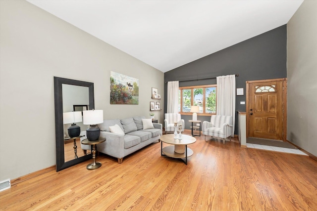 9912 S Kolmar Ave, Oak Lawn, IL 60453 - living room featuring high vaulted ceiling and light wood finished floors