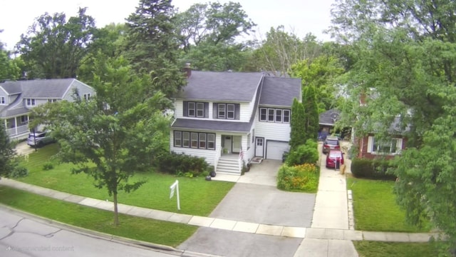 434 S Lewis Ave, Lombard, IL 60148 - traditional-style house with driveway, a front lawn, and a garage