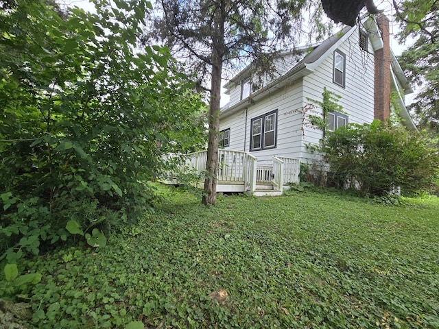 434 S Lewis Ave, Lombard, IL 60148 - view of home's exterior with a deck and a chimney