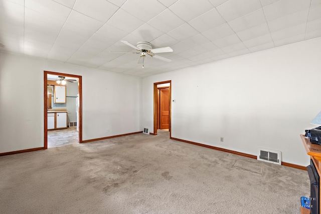 3715 Maple Ave, Mchenry, IL 60050 - spare room featuring a ceiling fan and carpet