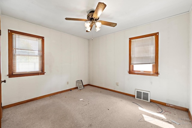 3715 Maple Ave, Mchenry, IL 60050 - carpeted spare room with baseboards and a ceiling fan