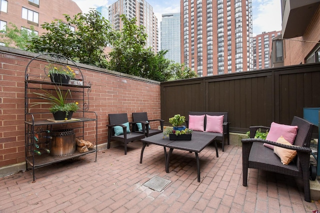 801 S Plymouth Ct Unit V, Chicago, IL 60605 - view of patio / terrace with outdoor lounge area and a view of city