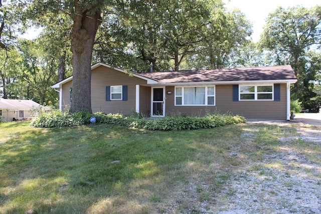 309 Bass St, Wilmington, IL 60481 - single story home featuring a front lawn