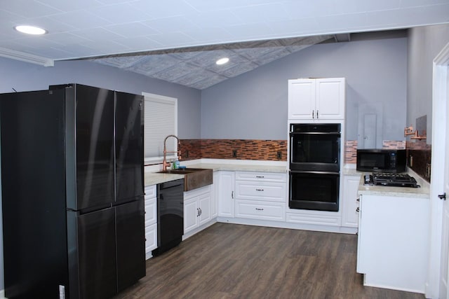 309 Bass St, Wilmington, IL 60481 - kitchen with black appliances, dark wood-style floors, white cabinets, light countertops, and recessed lighting