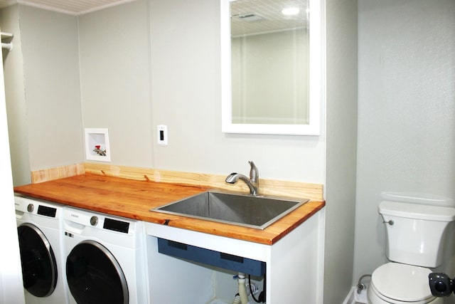 309 Bass St, Wilmington, IL 60481 - washroom featuring washer and clothes dryer and baseboards