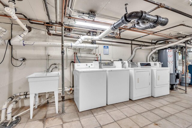 9819 S Cicero Ave Unit 6, Oak Lawn, IL 60453 - laundry area featuring separate washer and dryer and water heater