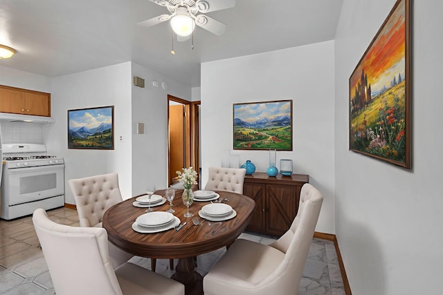 9819 S Cicero Ave Unit 6, Oak Lawn, IL 60453 - dining room featuring a ceiling fan and light marble finish flooring