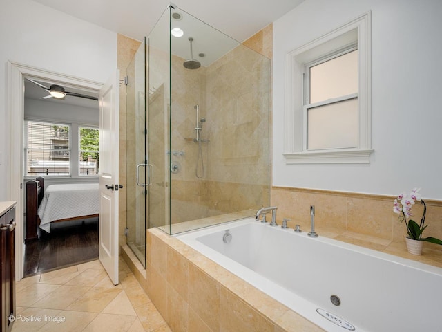 1416 W Olive Ave Unit 1, Chicago, IL 60660 - ensuite bathroom with a shower stall, a bath, and tile patterned floors