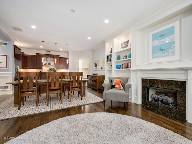 1416 W Olive Ave Unit 1, Chicago, IL 60660 - dining area with ornamental molding, dark wood-style floors, a high end fireplace, and recessed lighting