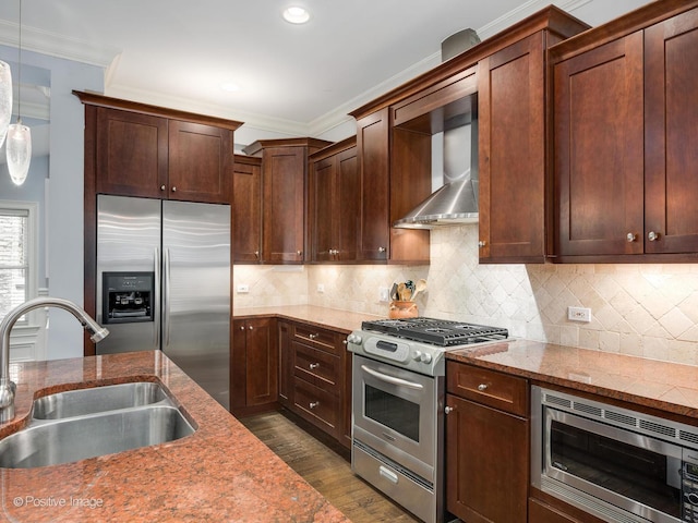 1416 W Olive Ave Unit 1, Chicago, IL 60660 - kitchen featuring appliances with stainless steel finishes, wall chimney range hood, dark wood-type flooring, light stone countertops, and tasteful backsplash