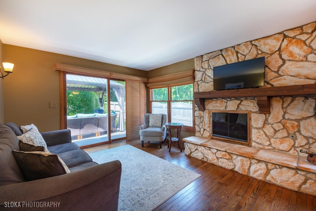 530 Sunnyside Ave, Gurnee, IL 60031 - living room featuring wood-type flooring and a stone fireplace