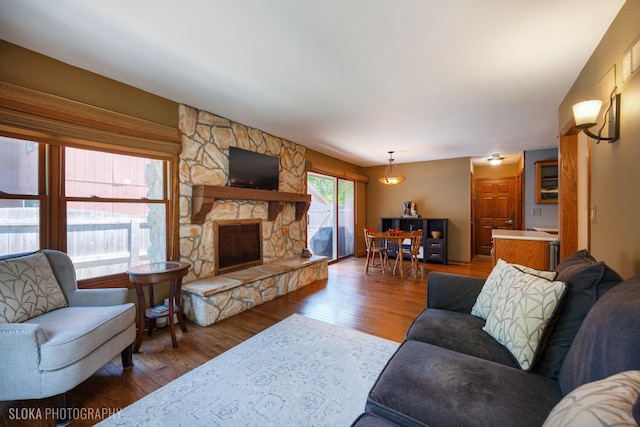 530 Sunnyside Ave, Gurnee, IL 60031 - living room featuring wood finished floors and a fireplace
