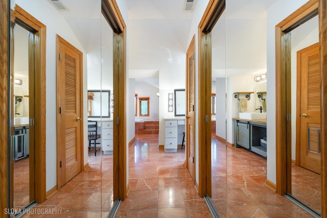 530 Sunnyside Ave, Gurnee, IL 60031 - hall with a sink and baseboards