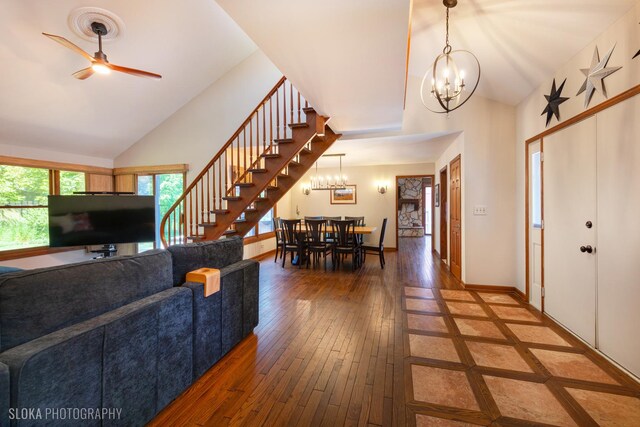 530 Sunnyside Ave, Gurnee, IL 60031 - living area featuring a chandelier, high vaulted ceiling, hardwood / wood-style flooring, stairs, and ceiling fan