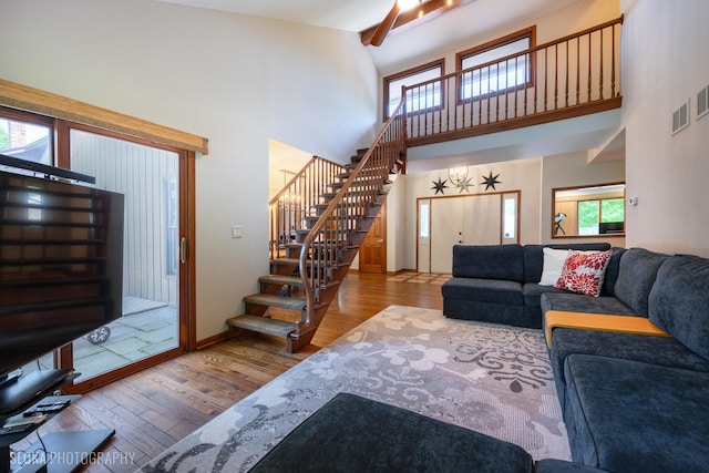 530 Sunnyside Ave, Gurnee, IL 60031 - living room with stairway, wood finished floors, and high vaulted ceiling