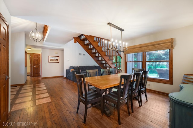 530 Sunnyside Ave, Gurnee, IL 60031 - dining space with a chandelier, stairway, and hardwood / wood-style floors