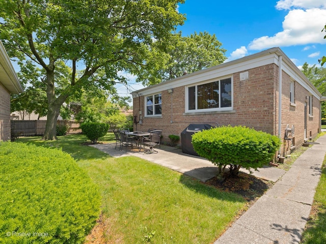 3318 Wilder St, Skokie, IL 60076 - back of property with brick siding and a patio area