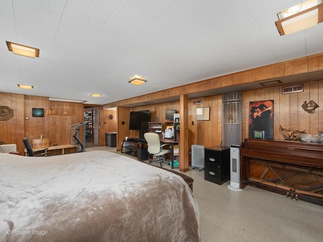 3318 Wilder St, Skokie, IL 60076 - bedroom featuring radiator, wooden walls, tile patterned floors, and an office area