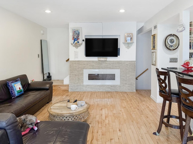 204 Inverrary Ln, Deerfield, IL 60015 - living room featuring hardwood / wood-style floors, recessed lighting, and a glass covered fireplace