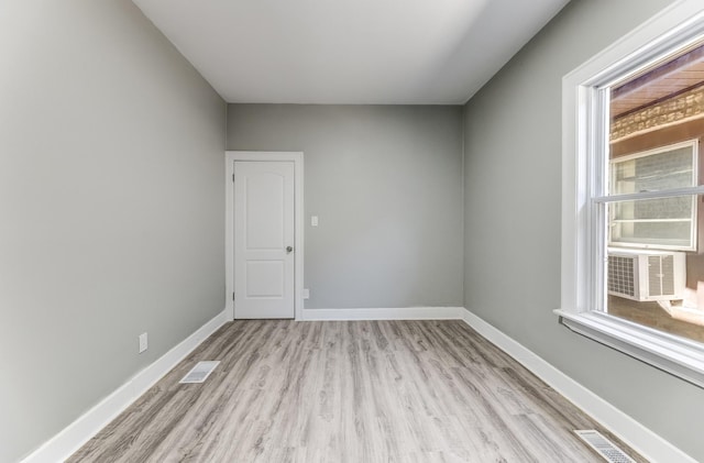 8510 S Blackstone Ave, Chicago, IL 60619 - unfurnished room featuring wood finished floors and healthy amount of natural light
