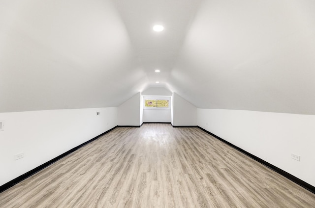 8510 S Blackstone Ave, Chicago, IL 60619 - bonus room featuring vaulted ceiling, recessed lighting, and wood finished floors