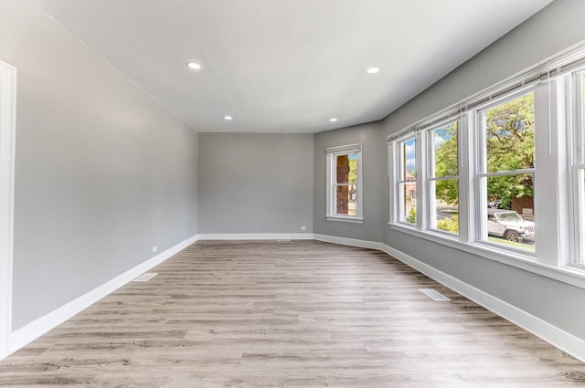 8510 S Blackstone Ave, Chicago, IL 60619 - unfurnished room featuring recessed lighting and light wood finished floors