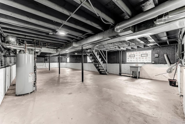 8510 S Blackstone Ave, Chicago, IL 60619 - below grade area featuring gas water heater and stairs