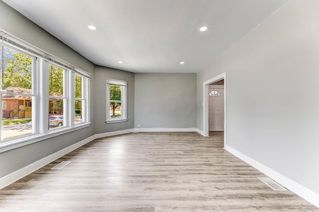 8510 S Blackstone Ave, Chicago, IL 60619 - unfurnished room with recessed lighting and light wood-type flooring