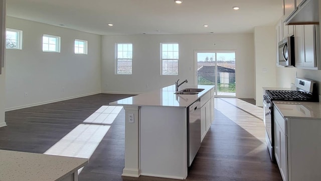 6475 Juniper Dr, Wonder Lake, IL 60097 - kitchen with appliances with stainless steel finishes, dark wood finished floors, an island with sink, open floor plan, and recessed lighting
