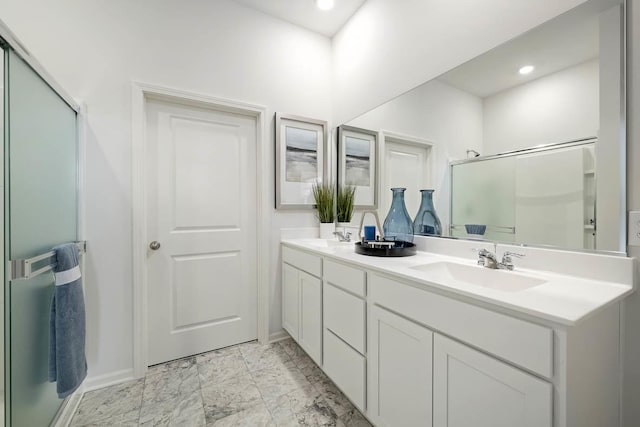 6475 Juniper Dr, Wonder Lake, IL 60097 - bathroom with double vanity, a shower with shower door, recessed lighting, and marble finish flooring