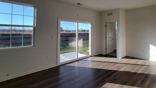 6475 Juniper Dr, Wonder Lake, IL 60097 - unfurnished room featuring wood finished floors and baseboards