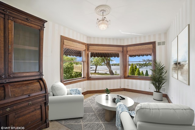 691 Lake Ave, Crystal Lake, IL 60014 - carpeted living room with wallpapered walls and plenty of natural light