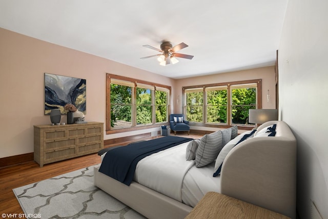 691 Lake Ave, Crystal Lake, IL 60014 - bedroom featuring multiple windows, wood finished floors, and a ceiling fan