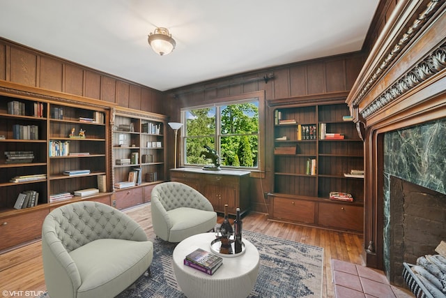 691 Lake Ave, Crystal Lake, IL 60014 - sitting room featuring wooden walls and light wood-type flooring